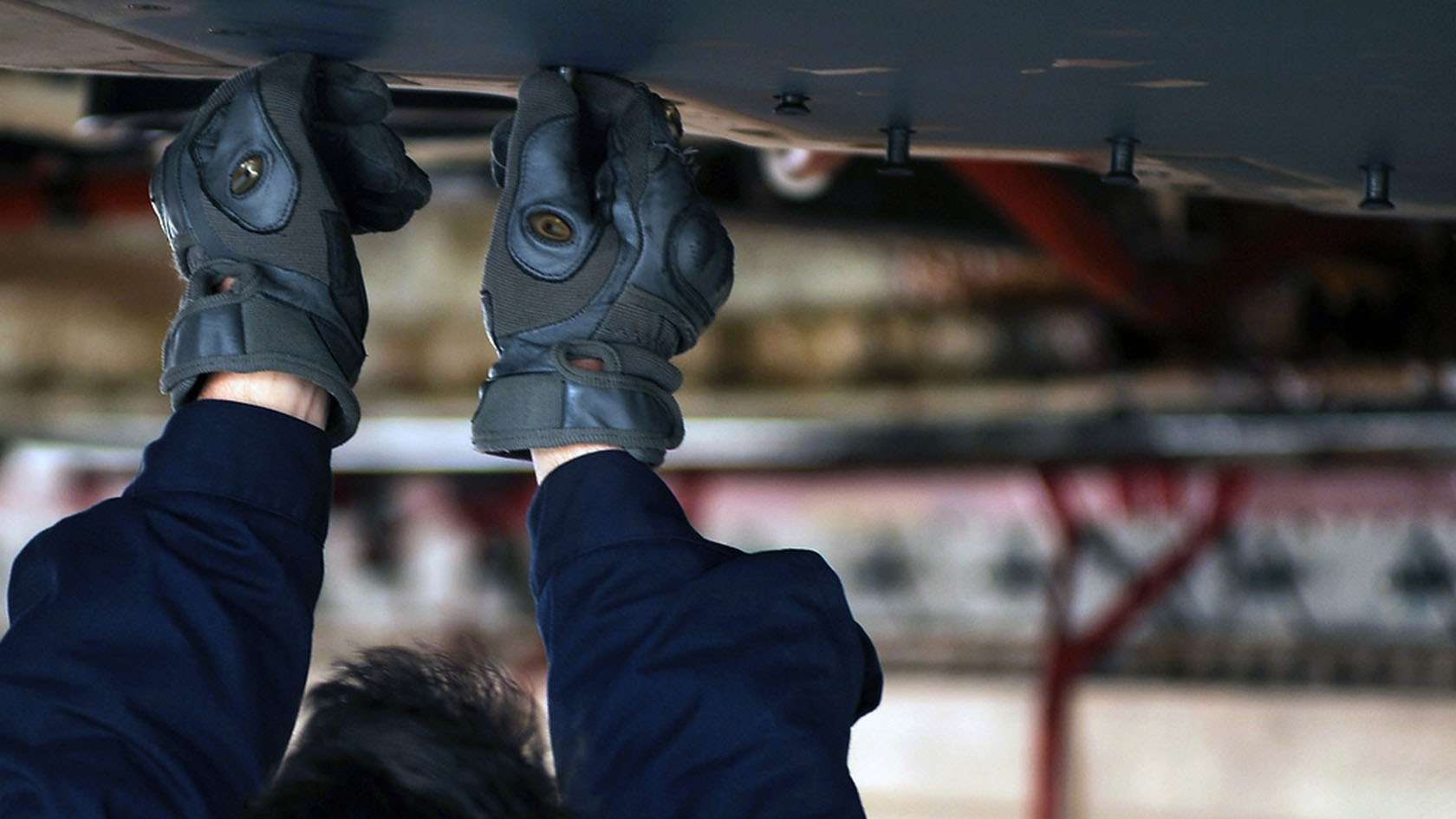 Aircraft Maintenance Technician Wearing Gloves